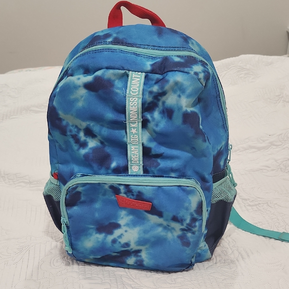 Highlights - Vibrant Tie Dye Blue Backpack with Red Handles